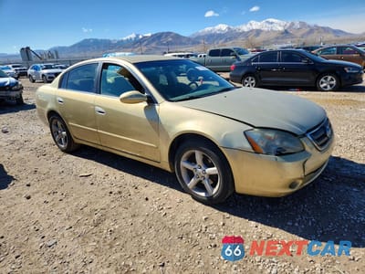 Czwarte zdjęcie samochodu z boku: 2002 NISSAN ALTIMA 2.5 VIN:1N4AL11D52C209955 - miniatura