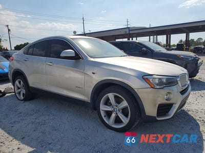 Czwarte zdjęcie samochodu z boku: 2015 BMW X4 XDRIVE28I VIN:5UXXW3C53F0M89149 - miniatura
