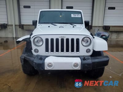 Piąte zdjęcie samochodu w środku: 2016 JEEP WRANGLER UNLIMITED SAHARA VIN:1C4HJWEG3GL106377 - miniatura