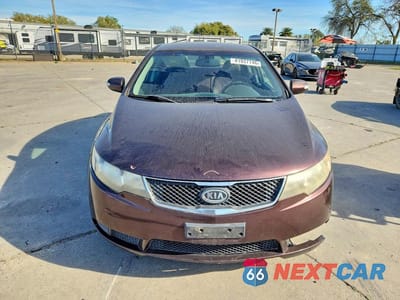 Piąte zdjęcie samochodu w środku: 2010 KIA FORTE VIN:KNAFU4A28A5191853 - miniatura