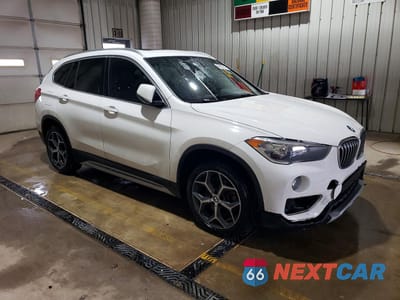Czwarte zdjęcie samochodu z boku: 2018 BMW X1 XDRIVE28I VIN:WBXHT3C39J3H33008 - miniatura