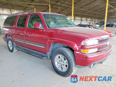 Czwarte zdjęcie samochodu z boku: 2006 CHEVROLET SUBURBAN C1500 VIN:1GNEC16ZX6J166836 - miniatura