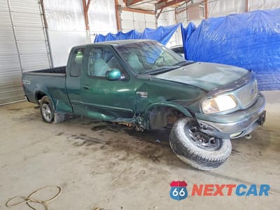 Czwarte zdjęcie samochodu z boku: 1999 FORD F150 VIN:1FTRX18L1XNA06068 - miniatura