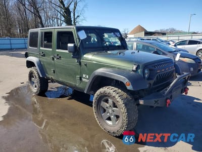 Czwarte zdjęcie samochodu z boku: 2009 JEEP WRANGLER UNLIMITED X VIN:1J4GA39149L719055 - miniatura