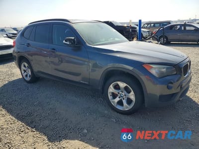 Czwarte zdjęcie samochodu z boku: 2014 BMW X1 SDRIVE28I VIN:WBAVM1C59EVW56454 - miniatura