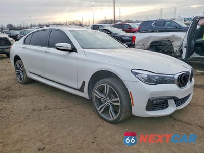 Czwarte zdjęcie samochodu z boku: 2017 BMW 740 I VIN:WBA7E2C39HG740616 - miniatura