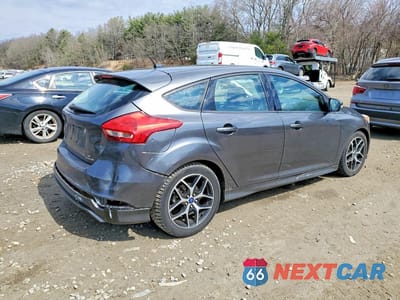 Trzecie zdjęcie samochodu z tyłu: 2016 FORD FOCUS SE VIN:1FADP3K29GL333356 - miniatura