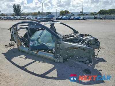 Czwarte zdjęcie samochodu z boku: 2018 TESLA MODEL 3 VIN:5YJ3E1EA6JF092675 - miniatura