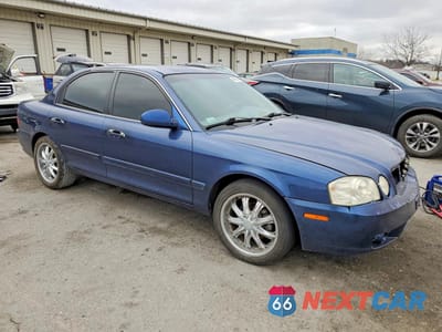 Czwarte zdjęcie samochodu z boku: 2005 KIA OPTIMA LX VIN:KNAGD126355405786 - miniatura