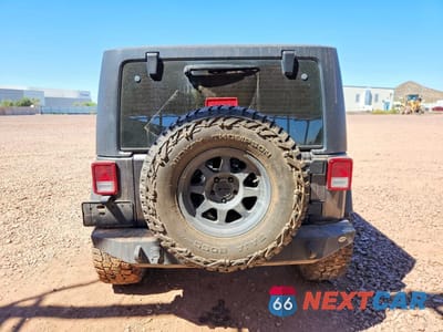 Zdjęcie 6 z 12 samochodu: 2017 JEEP WRANGLER SPORT VIN:1C4AJWAG8HL720480 - miniatura
