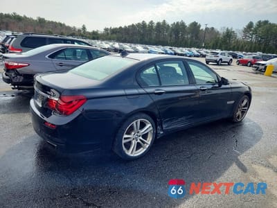 Trzecie zdjęcie samochodu z tyłu: 2014 BMW 750 VIN:WBAYB6C55ED224188 - miniatura