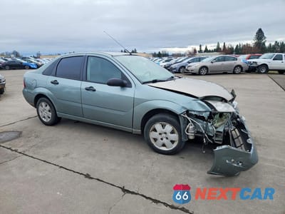 Czwarte zdjęcie samochodu z boku: 2006 FORD FOCUS ZX4 VIN:1FAFP34N96W133784 - miniatura