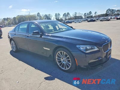 Czwarte zdjęcie samochodu z boku: 2014 BMW 750 LXI VIN:WBAYF8C57ED653767 - miniatura