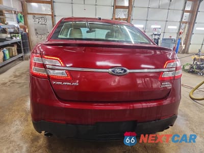 Zdjęcie 6 z 11 samochodu: 2014 FORD TAURUS SEL VIN:1FAHP2E86EG113108 - miniatura