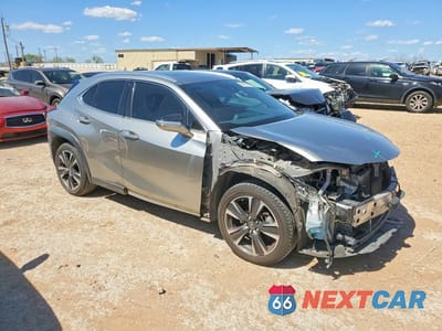 Czwarte zdjęcie samochodu z boku: 2019 LEXUS UX 200 BASE VIN:JTHY3JBH6K2017765 - miniatura