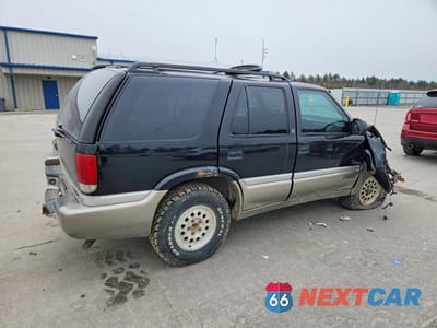 Trzecie zdjęcie samochodu z tyłu: 2001 GMC JIMMY VIN:1GKDT13W712176326 - miniatura
