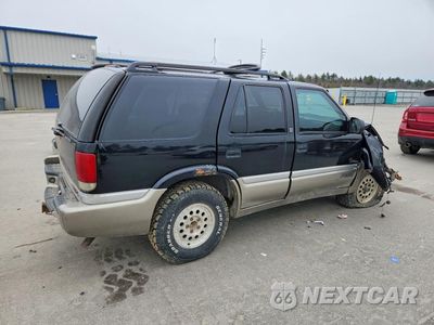 Trzecie zdjęcie samochodu z tyłu: 2001 GMC JIMMY VIN:1GKDT13W712176326 - miniatura
