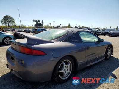Trzecie zdjęcie samochodu z tyłu: 1997 MITSUBISHI ECLIPSE GST VIN:4A3AK54F6VE171899 - miniatura