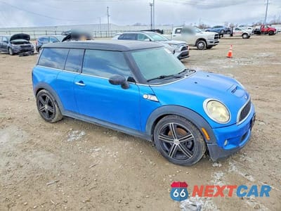 Czwarte zdjęcie samochodu z boku: 2010 MINI COOPER S CLUBMAN VIN:WMWMM3C51ATZ32767 - miniatura