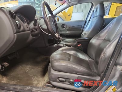 Zdjęcie 7 z 13 samochodu: 2004 PONTIAC GRAND PRIX GTP VIN:2G2WR524341359032 - miniatura