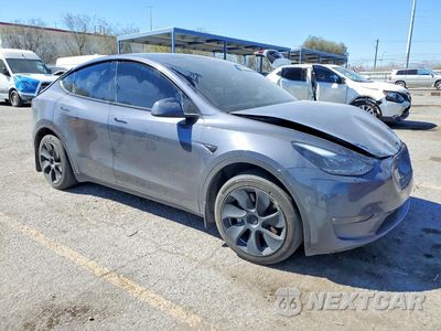 Czwarte zdjęcie samochodu z boku: 2023 TESLA MODEL Y VIN:7SAYGDEE3PF744538 - miniatura