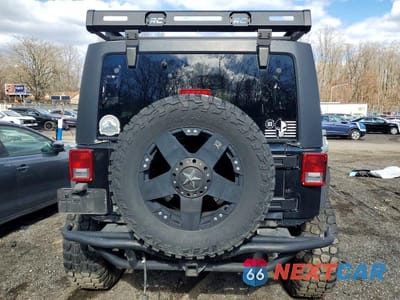 Zdjęcie 6 z 11 samochodu: 2013 JEEP WRANGLER UNLIMITED SPORT VIN:1C4BJWDG1DL514637 - miniatura