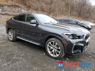 Czwarte zdjęcie samochodu z boku: 2023 BMW X6 XDRIVE40I VIN:5UXCY6C02P9P88613 - miniatura