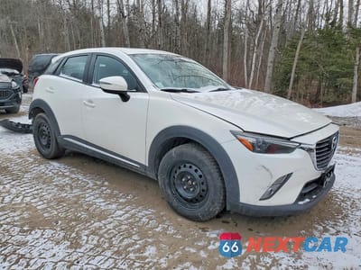 Czwarte zdjęcie samochodu z boku: 2018 MAZDA CX-3 GRAND TOURING VIN:JM1DKDD75J0302945 - miniatura