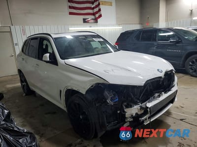 Czwarte zdjęcie samochodu z boku: 2021 BMW X5 XDRIVE40I VIN:5UXCR6C02M9E99310 - miniatura