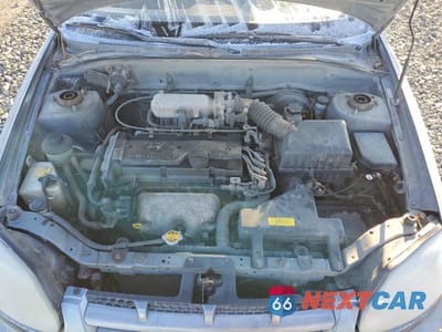 Zdjęcie 11 z 12 samochodu: 2003 HYUNDAI ACCENT BASE VIN:KMHCF35C63U271055 - miniatura