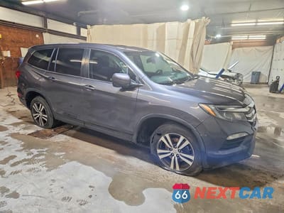 Czwarte zdjęcie samochodu z boku: 2016 HONDA PILOT EXL VIN:5FNYF6H5XGB067706 - miniatura