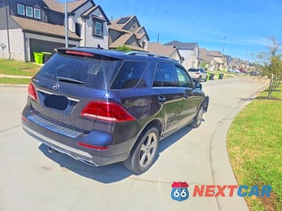 Czwarte zdjęcie samochodu z boku: 2017 MERCEDES-BENZ GLE 350 VIN:4JGDA5JB2HA940636 - miniatura