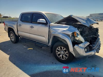 Czwarte zdjęcie samochodu z boku: 2018 TOYOTA TACOMA SR5 V6 VIN:3TMAZ5CN9JM072229 - miniatura
