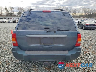 Zdjęcie 6 z 13 samochodu: 2001 JEEP GRAND CHEROKEE LAREDO VIN:1J4GW48S31C540513 - miniatura