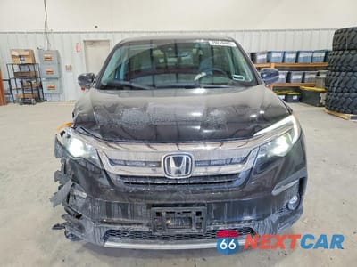 Piąte zdjęcie samochodu w środku: 2020 HONDA PILOT EXL VIN:5FNYF6H51LB016640 - miniatura