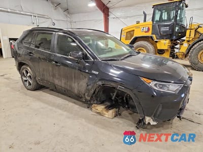 Czwarte zdjęcie samochodu z boku: 2021 TOYOTA RAV4 PRIME SE VIN:JTMCB3FV7MD056883 - miniatura