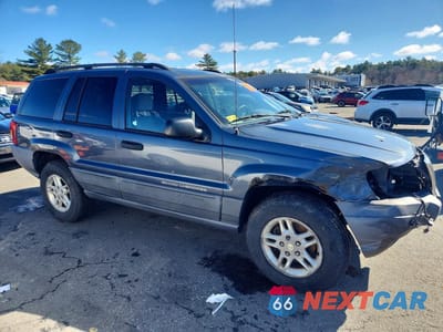 Czwarte zdjęcie samochodu z boku: 2001 JEEP GRAND CHEROKEE LAREDO VIN:1J4GW48S11C700338 - miniatura