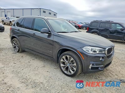 Czwarte zdjęcie samochodu z boku: 2018 BMW X5 XDRIVE35I VIN:5UXKR0C50JL077018 - miniatura