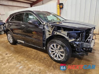 Czwarte zdjęcie samochodu z boku: 2023 CADILLAC XT4 PREMIUM LUXURY VIN:1GYFZDR40PF104308 - miniatura