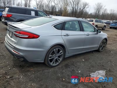 Trzecie zdjęcie samochodu z tyłu: 2020 FORD FUSION TITANIUM VIN:3FA6P0D96LR174468 - miniatura