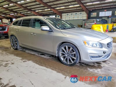 Czwarte zdjęcie samochodu z boku: 2015 VOLVO V60 PREMIER VIN:YV140MEK0F1225910 - miniatura