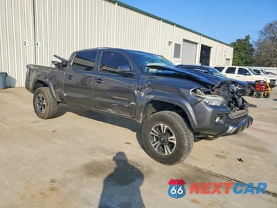 Czwarte zdjęcie samochodu z boku: 2018 TOYOTA TACOMA DOUBLE CAB VIN:3TMBZ5DN2JM014322 - miniatura