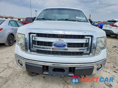 Piąte zdjęcie samochodu w środku: 2014 FORD F150 SUPERCREW VIN:1FTFW1EF8EFA29343 - miniatura