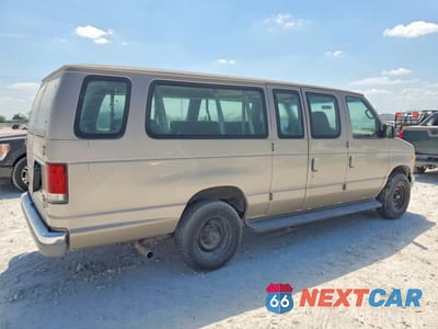 Trzecie zdjęcie samochodu z tyłu: 2001 FORD ECONOLINE E350 SUPER DUTY WAGON VIN:1FBSS31S61HA19390 - miniatura