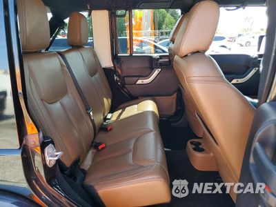 Zdjęcie 11 z 14 samochodu: 2015 JEEP WRANGLER UNLIMITED SAHARA VIN:1C4BJWEG3FL530761 - miniatura