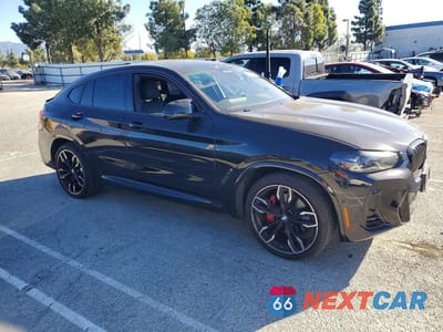 Czwarte zdjęcie samochodu z boku: 2024 BMW X4 M40I VIN:5UX43DT06R9U14953 - miniatura