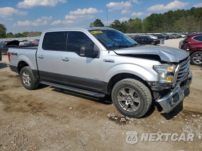 Czwarte zdjęcie samochodu z boku: 2015 FORD F150 SUPERCREW VIN:1FTEW1EP2FKE07721 - miniatura
