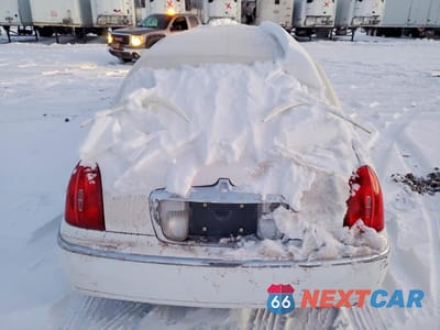 Zdjęcie 6 z 13 samochodu: 1998 LINCOLN TOWN CAR LIMOUSINE VIN:1L1LM81W1WY603839 - miniatura