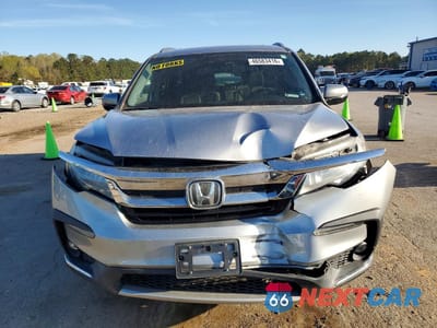 Piąte zdjęcie samochodu w środku: 2020 HONDA PILOT TOURING VIN:5FNYF5H68LB019425 - miniatura