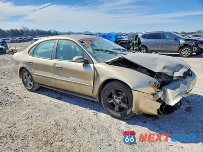 Czwarte zdjęcie samochodu z boku: 2000 FORD TAURUS SE VIN:1FAFP5322YA218565 - miniatura